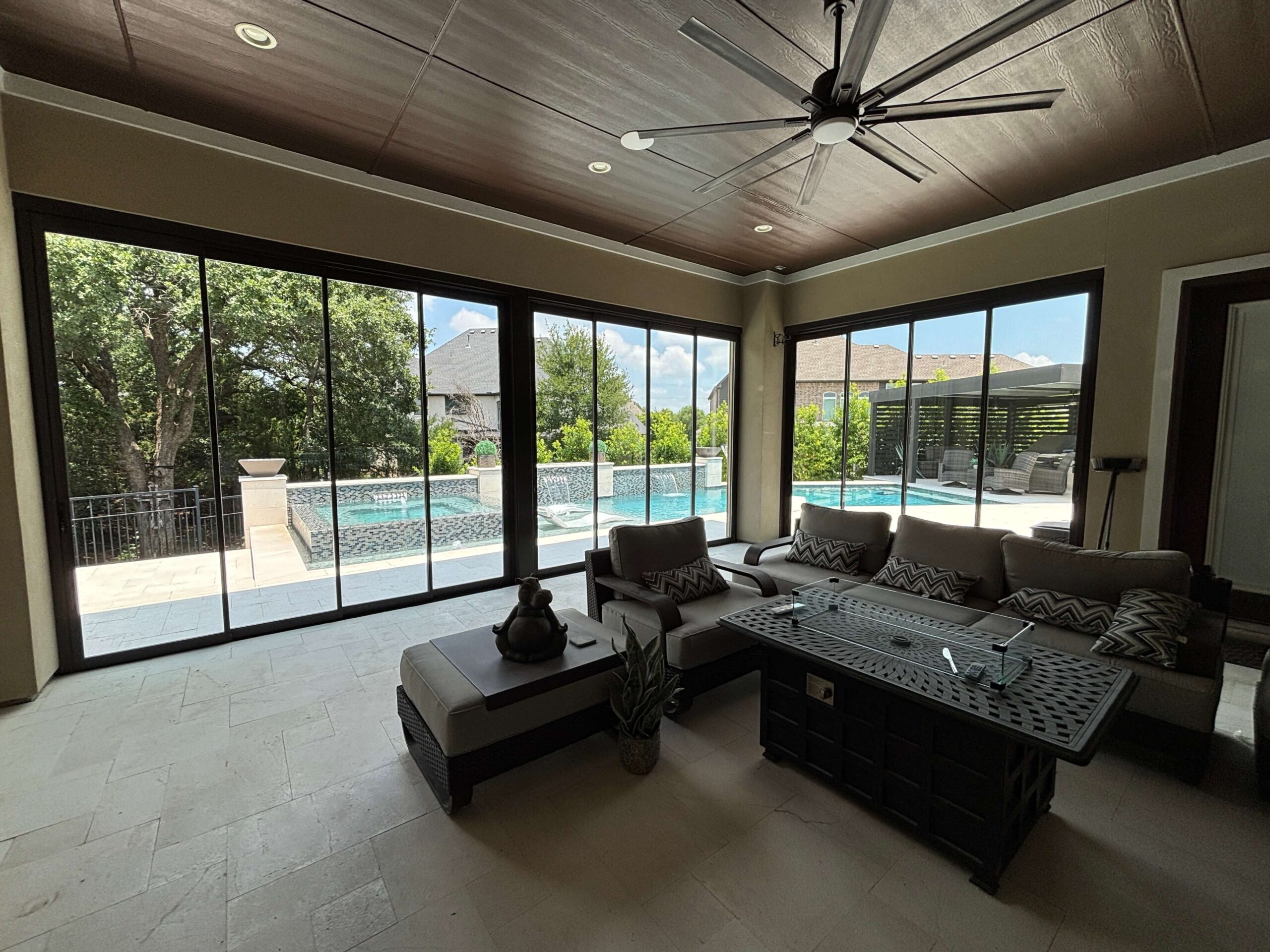 Multi-slide glass wall system installed by Double T Screened Patios in Flower Mound